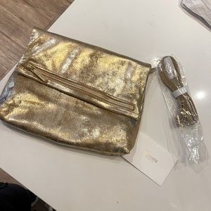 Hammitt Med VIP bag can be a clutch or use strap.